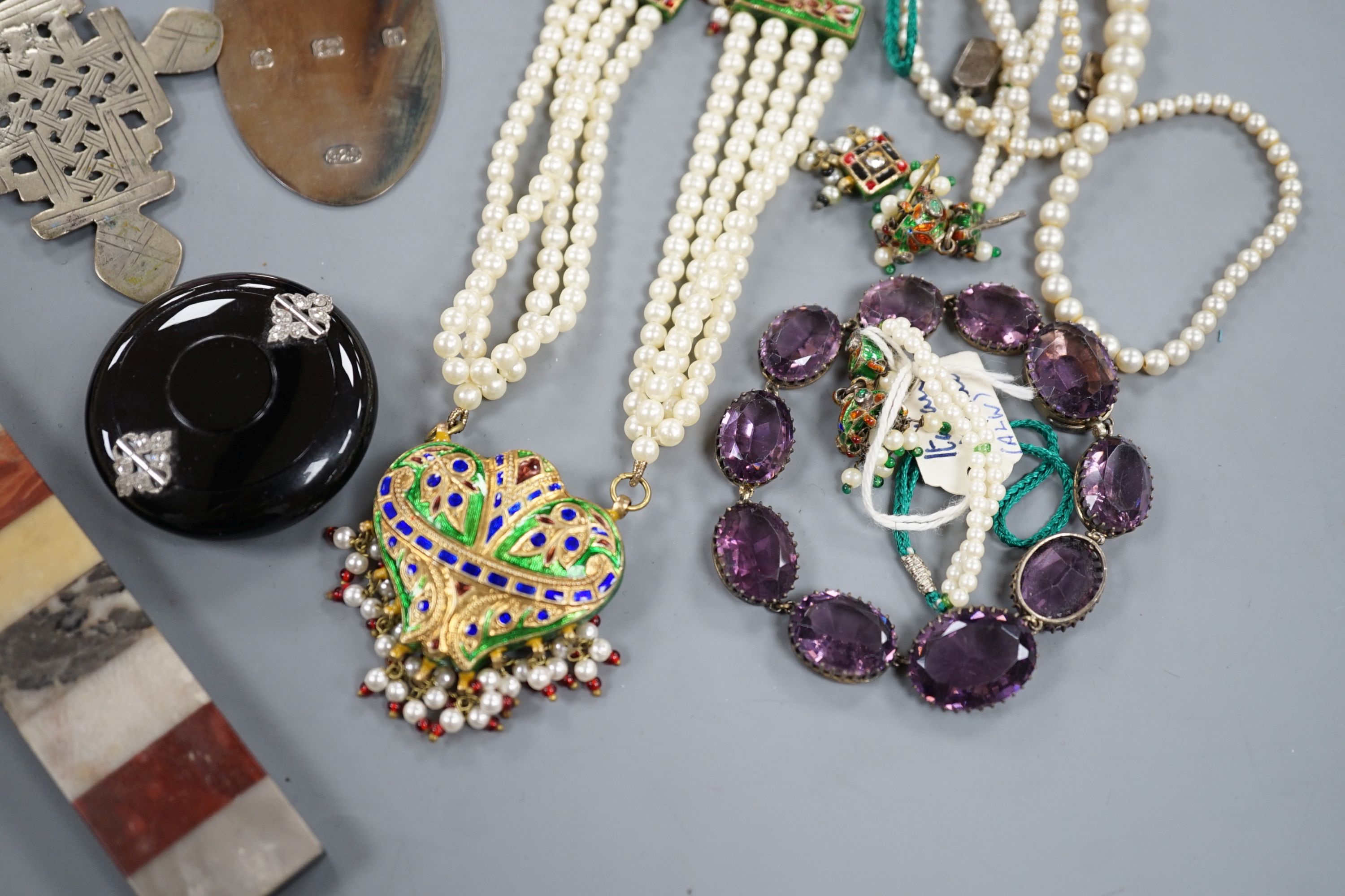 An early 20th century French white metal and diamond chip set tortoiseshell? circular pill box, maker's mark for Michel Ballada, 42mm and a small quantity of assorted jewellery.